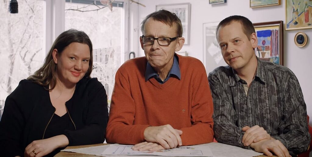 Anna Rosling Rönnlund, Hans Rosling e Ola Rosling seduti a un tavolo